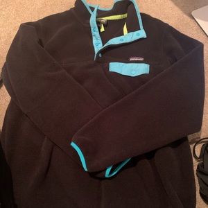 Black Columbia Jacket with Blue Trim